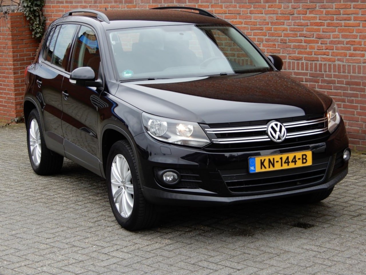 Volkswagen Tiguan - 1.4 TSI Sport&Style 1.4 TSI SPORTenSTYLE - AutoWereld.nl