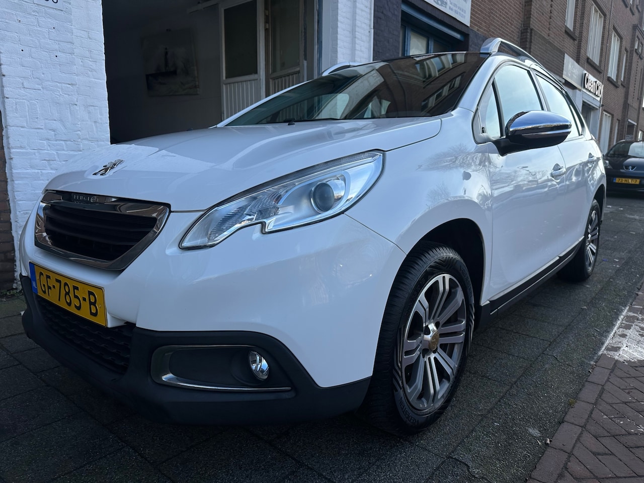 Peugeot 2008 - 1.2 PureTech AUTOMAAT Dealer Onderhouden Pano Cruise Airco Nette Auto - AutoWereld.nl