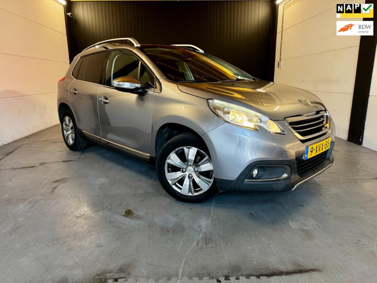 Peugeot 2008 - 1.2 PureTech Allure | PANO | NAVI |PDC |2014 - AutoWereld.nl