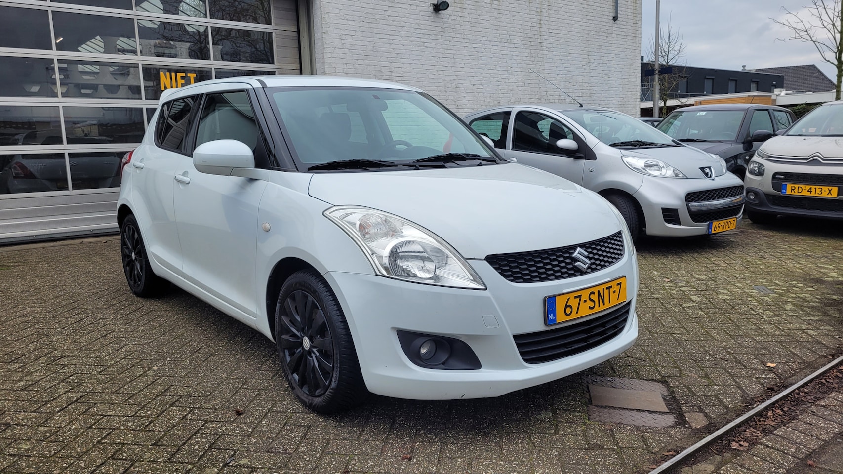 Suzuki Swift - 1.2 Exclusive EASSS 1.2 Exclusive EASSS - AutoWereld.nl