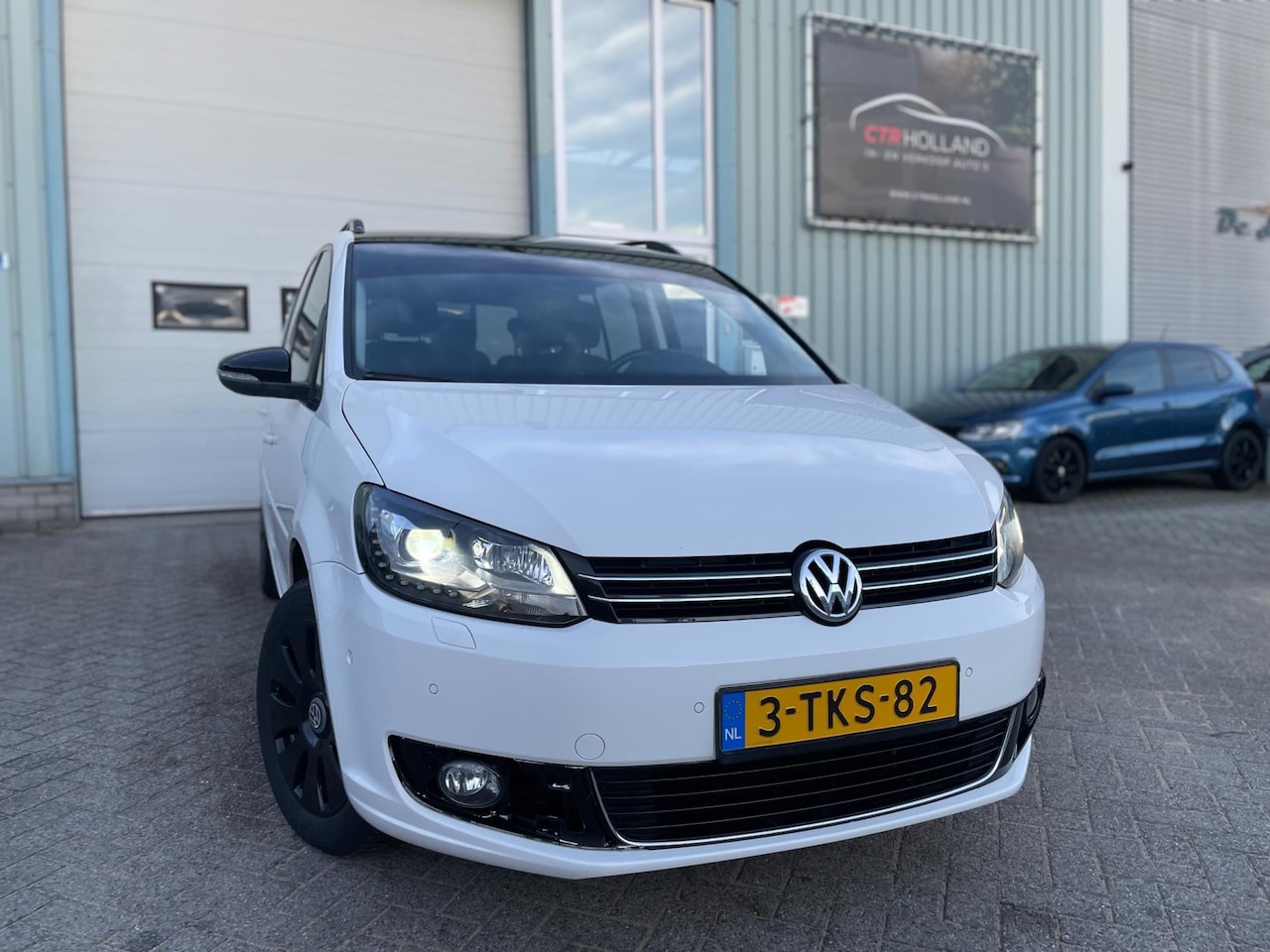 Volkswagen Touran - 2.0 TDI 103KW DSG BlueMotion (bj 2014) XENON|LED|NAVI|LMV - AutoWereld.nl