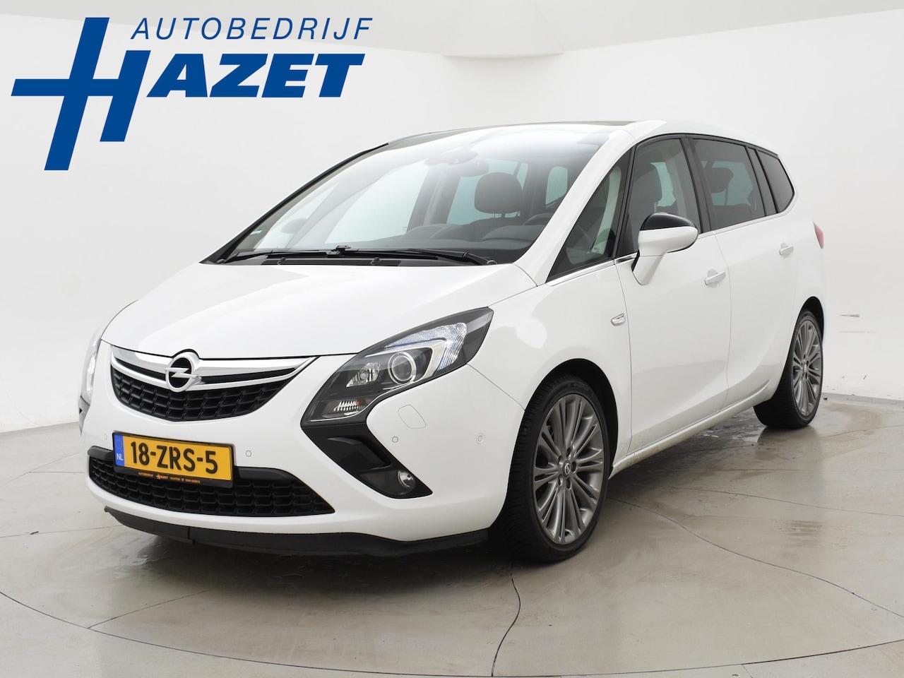 Opel Zafira Tourer - 1.4T AUT. COSMO 7-PERS. + PANORAMA | LEDER | 18 INCH | STOELVERW. | STUURVERW. | NAVIGATIE - AutoWereld.nl