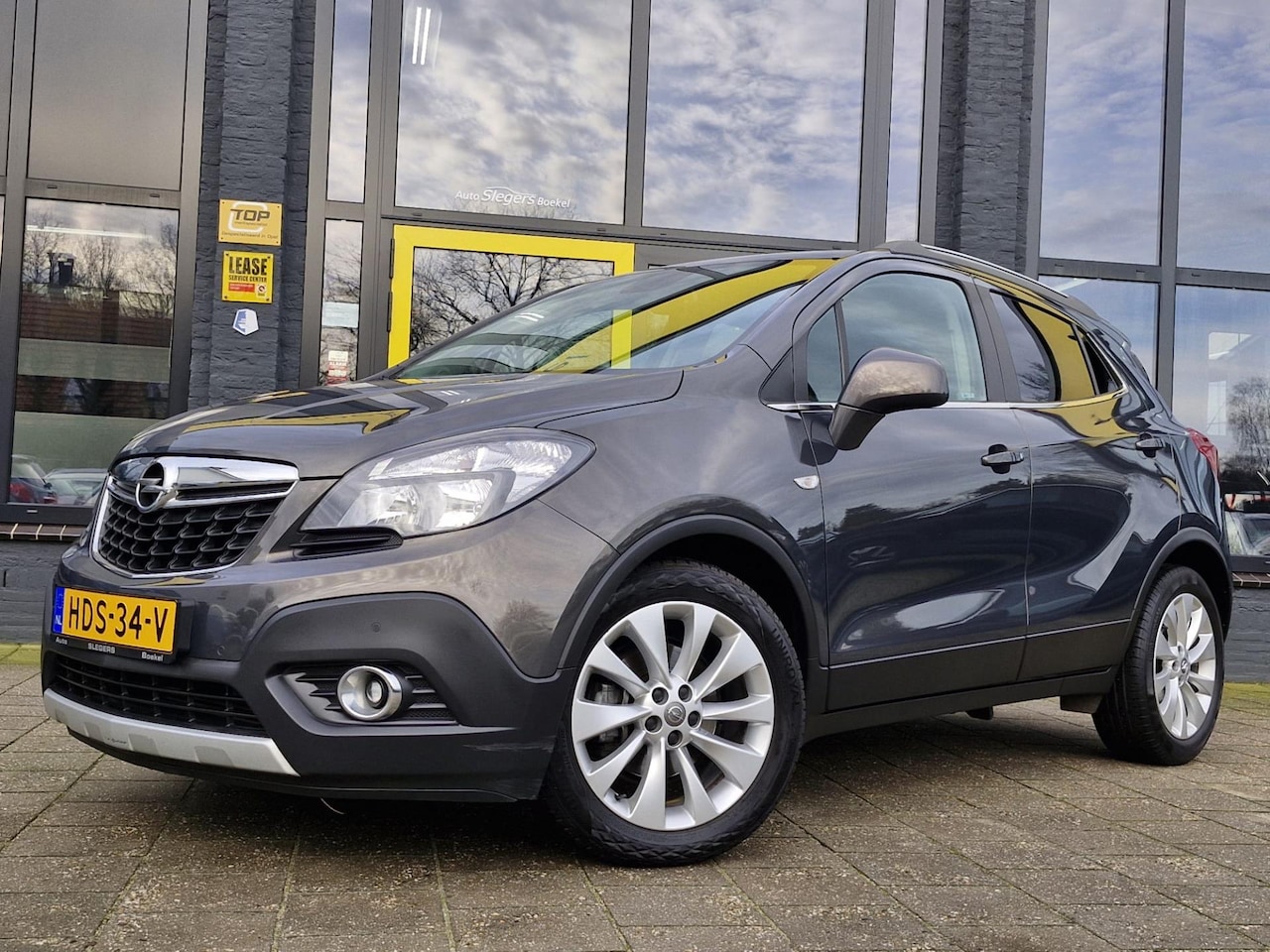 Opel Mokka - 1.4 T Cosmo | Trekhaak | Parkeersensoren | Stoelverw | Stuurverw | Cruise Control | Gerege - AutoWereld.nl