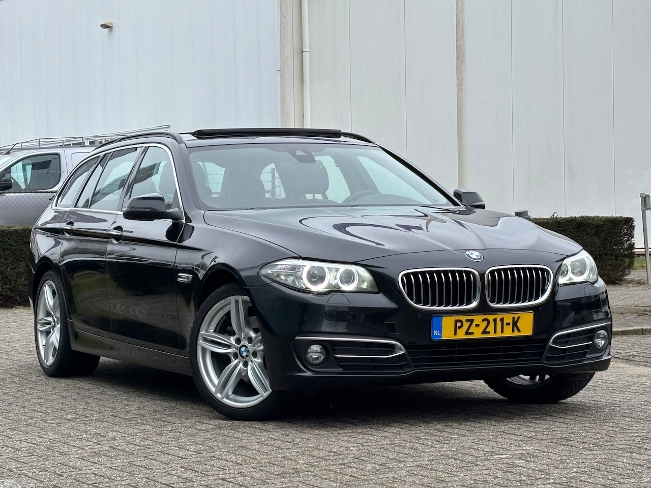 BMW 5-serie Touring - 520i High Executive - AutoWereld.nl