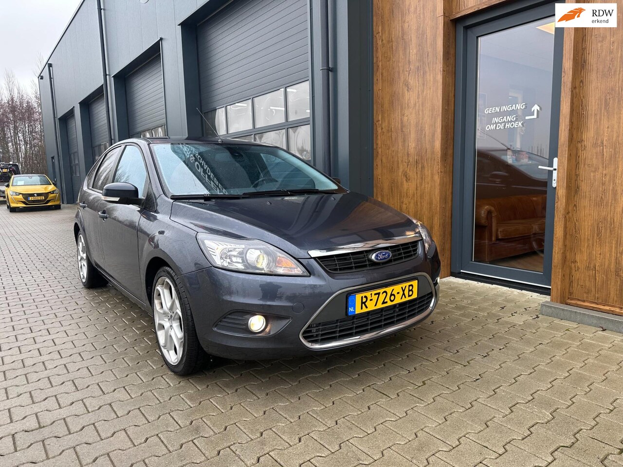 Ford Focus - 2.0 Titanium luxe uitvoering, stoelverwarming, climate - AutoWereld.nl