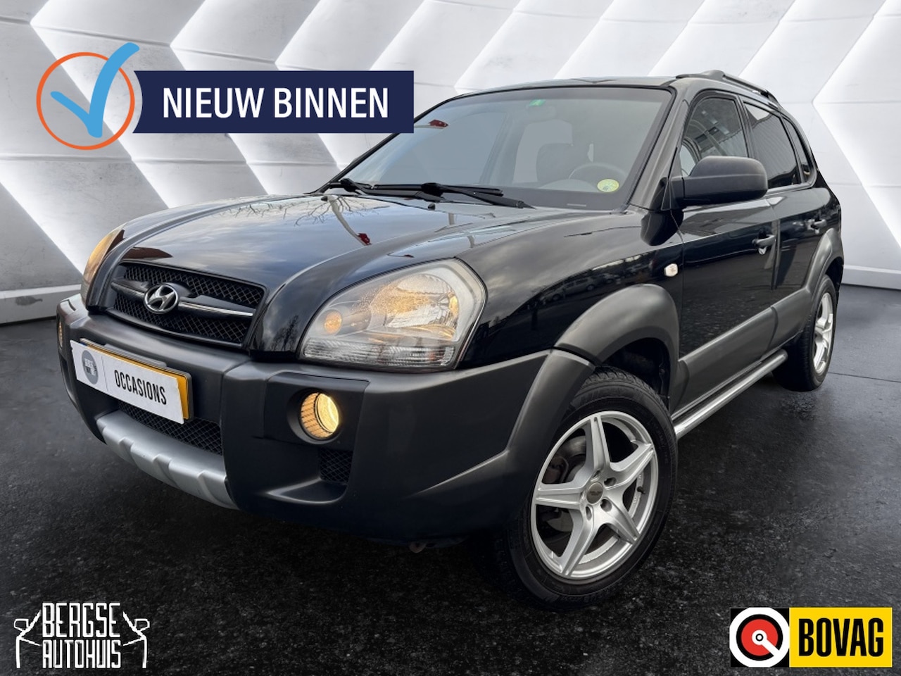 Hyundai Tucson - 2.0i Dynamic Cross Cruise Airco Nap Lmv BT - AutoWereld.nl