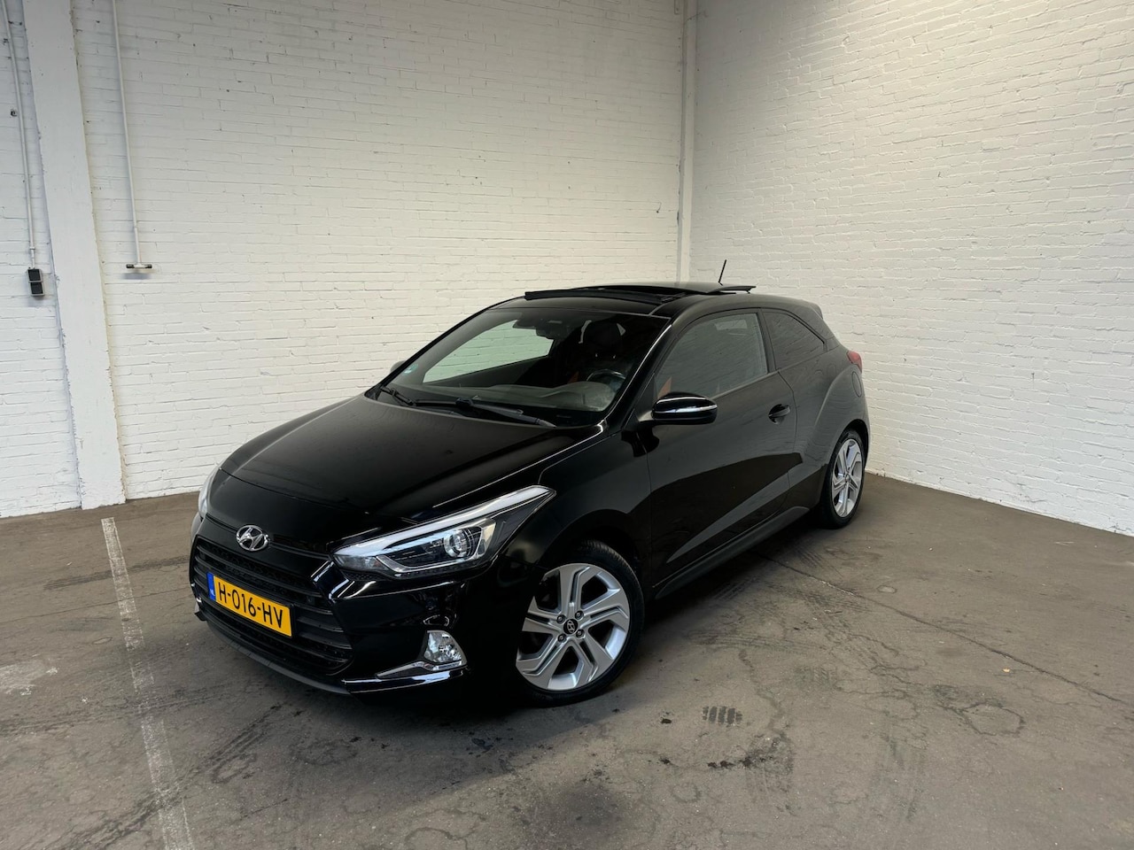 Hyundai i20 - 1.2 HP i-Motion Premium Pano|Camera - AutoWereld.nl