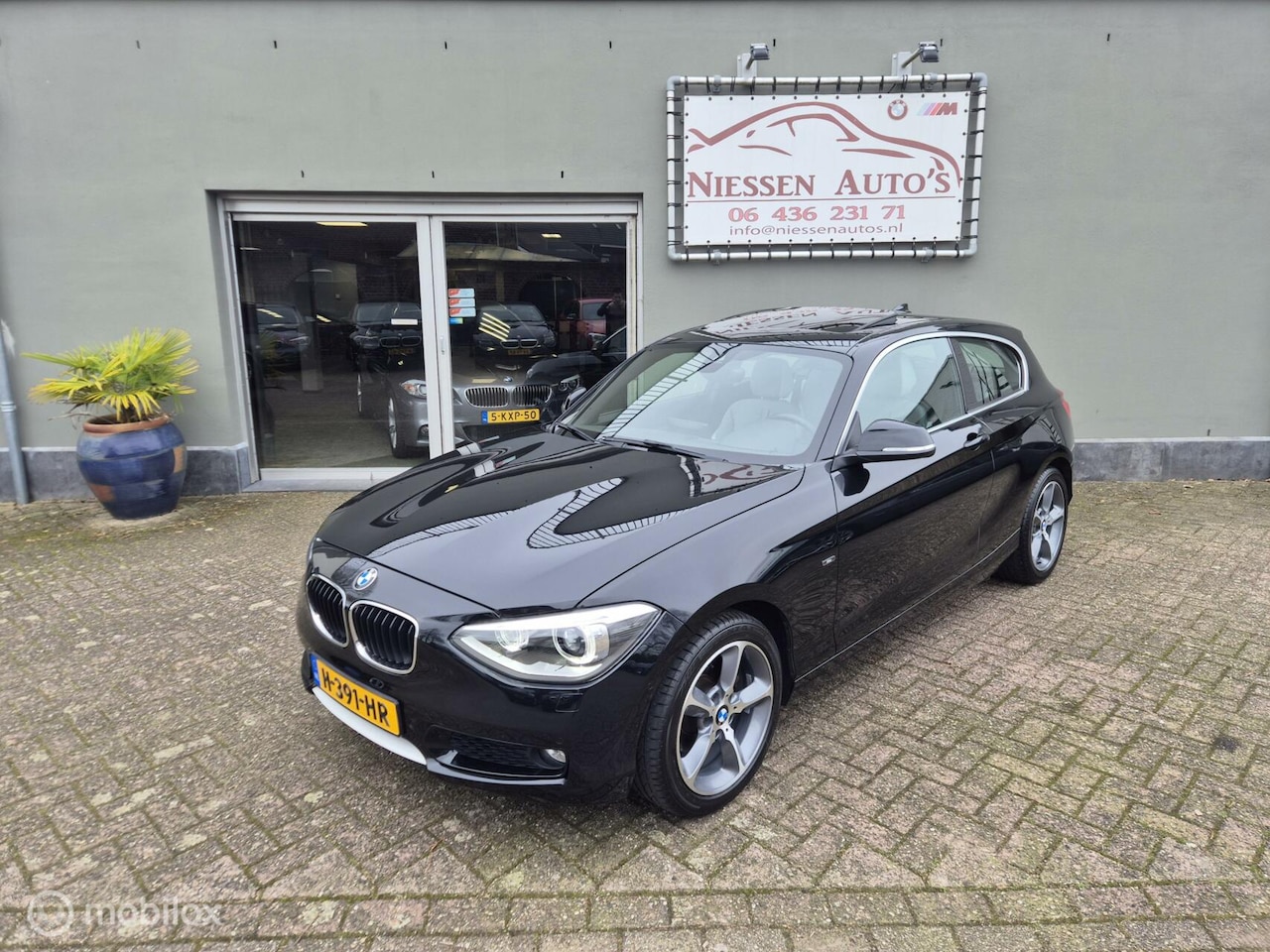 BMW 1-serie - F21 118i Urban Line Navi/Led/Dakje/Nwe Ketting - AutoWereld.nl