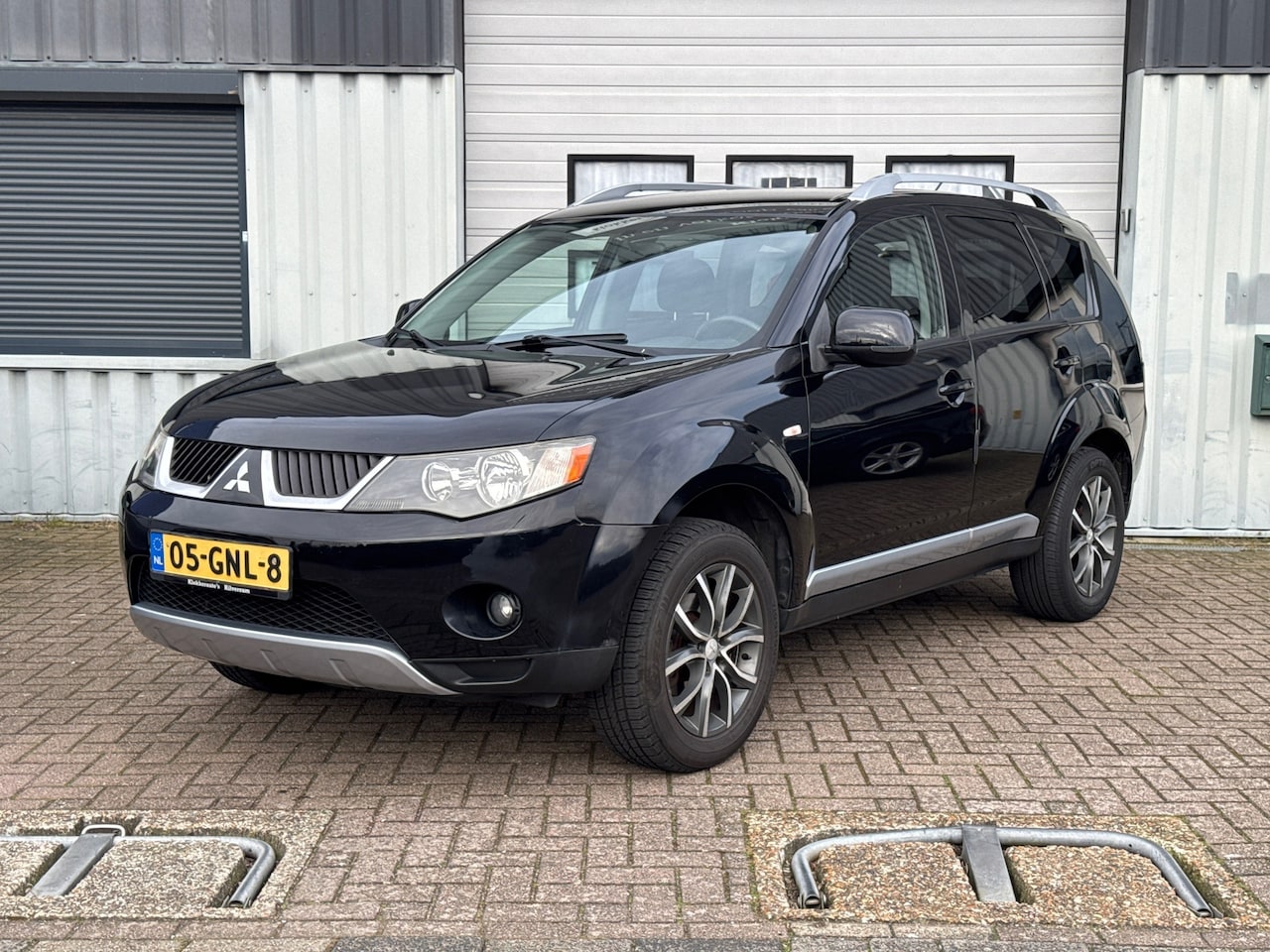 Mitsubishi Outlander - 2.4 Intro Edition 2WD Airco | Clima | Cruise | Trekhaak - AutoWereld.nl