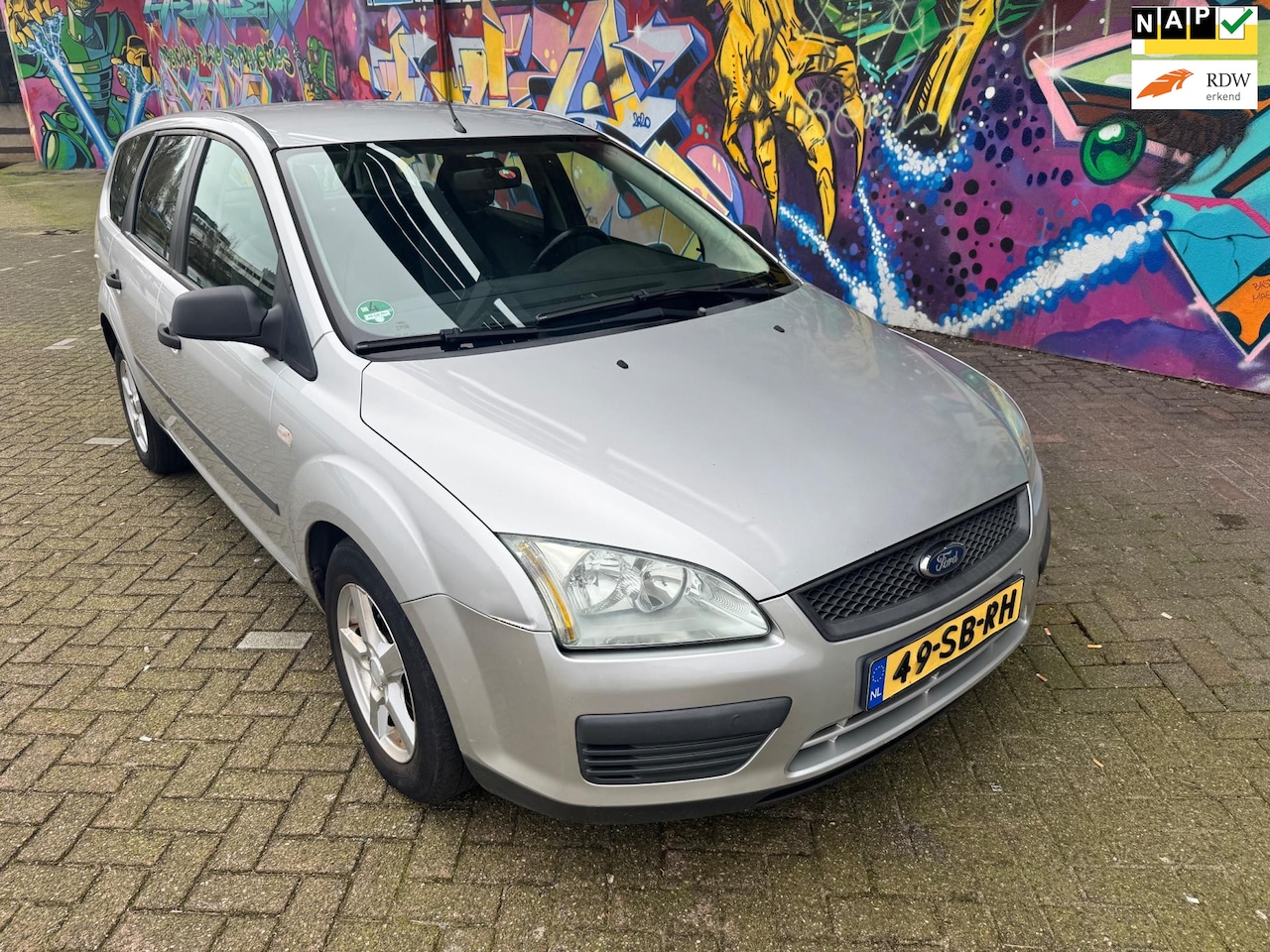 Ford Focus Wagon - 1.6-16V Champion airco sport velgen stereo alle boeken aanwezig goed onderhouden rijd lekk - AutoWereld.nl