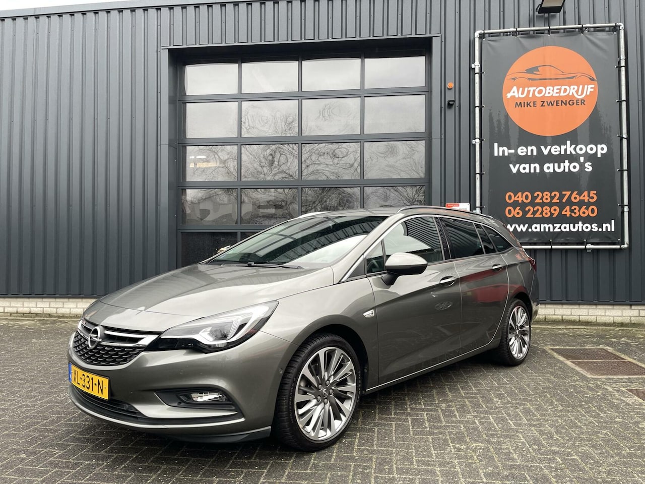 Opel Astra Sports Tourer - 1.6 Turbo Innovation CARPLAY|BLIS|TREKHAAK|CAMERA|KEYLESS|KOFFERLEP ELEKTRISCH|ORIGINEEL N - AutoWereld.nl