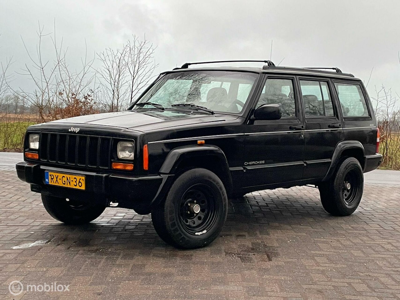 Jeep Cherokee - 4.0i Limited 4.0i Limited - AutoWereld.nl