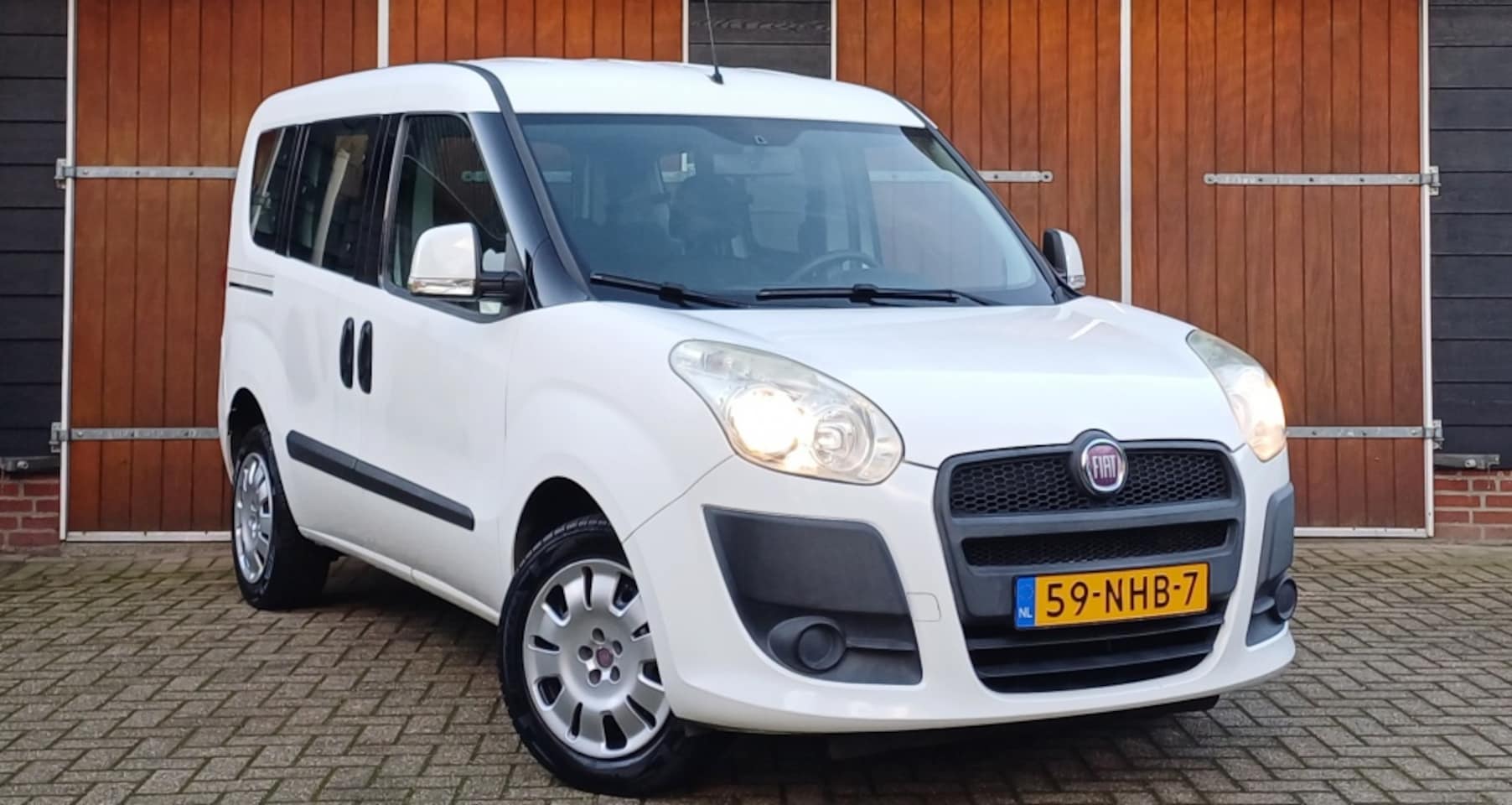 Fiat Doblò - 1.4 Dynamic 7 persoons, Airco, Dubbele schuifdeur, Nieuwe koppel - AutoWereld.nl