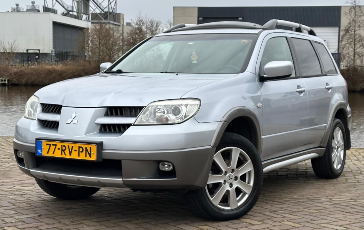 Mitsubishi Outlander - 2.4 Intense 4WD 2.4 Intense 4WD - AutoWereld.nl