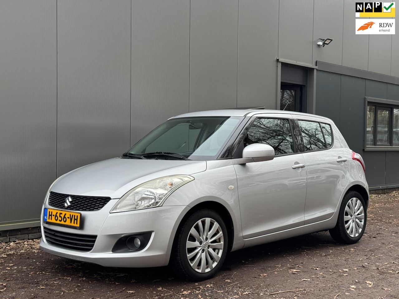 Suzuki Swift - 1.2 Exclusive EAS CLIMA|CRUISE|STOELV|OPEN DAK| - AutoWereld.nl