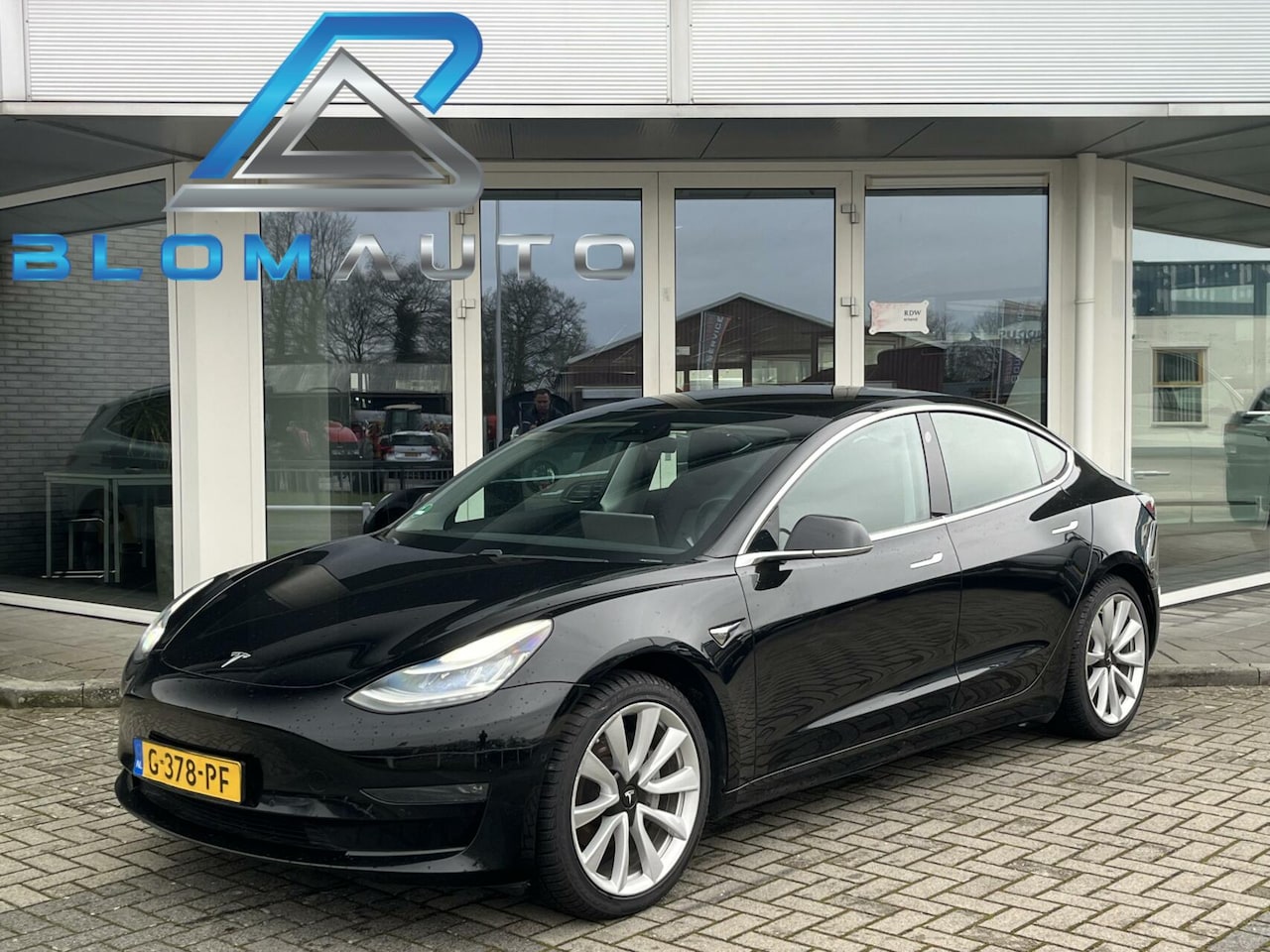 Tesla Model 3 - Long Range RWD Long Range AWD 75 kWh 352PK PERFORMANCE VELG - AutoWereld.nl