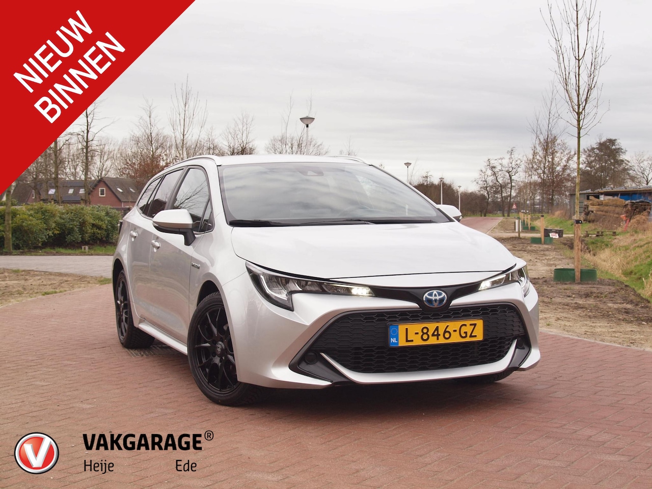 Toyota Corolla Touring Sports - 1.8 Hybrid Business | Apple Carplay | Camera | Cruise Contol | Navi | - AutoWereld.nl