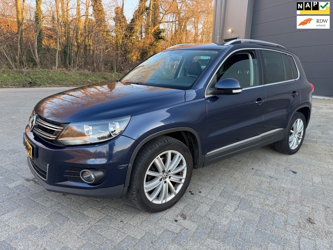 Volkswagen Tiguan - 2.0 TSI Sport&Style 4Motion - AutoWereld.nl