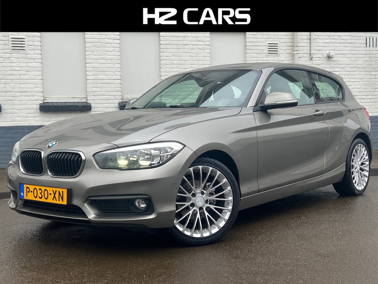 BMW 1-serie - 116i Essential|3drs|18"|PDC|Navi|Cruise|Bluetooth - AutoWereld.nl