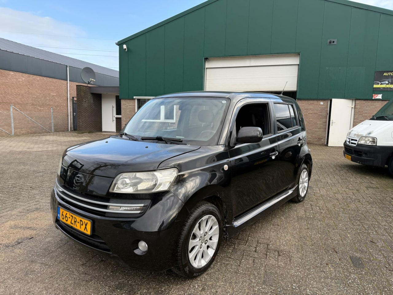 Daihatsu Materia - 1.3 Rythm Airco LM velgen APK black on black - AutoWereld.nl