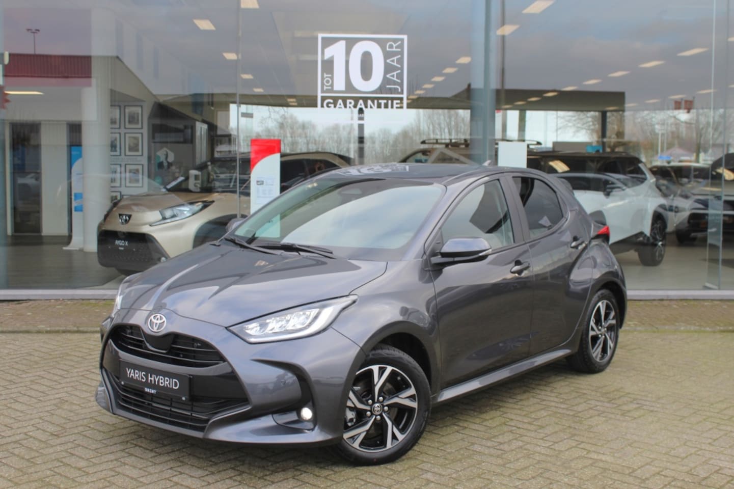 Toyota Yaris - 1.5 Hybrid 115 Style | Sensoren v/a | Stoel- en Stuurverwerwarmi - AutoWereld.nl