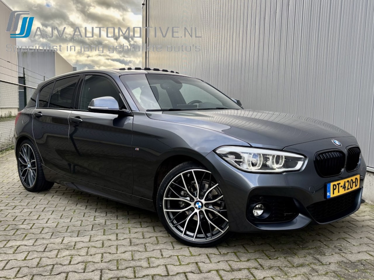 BMW 1-serie - 118i AUT. HIGH EXE M-SPORT 19" M PERFORMANCE / OPEN DAK - AutoWereld.nl