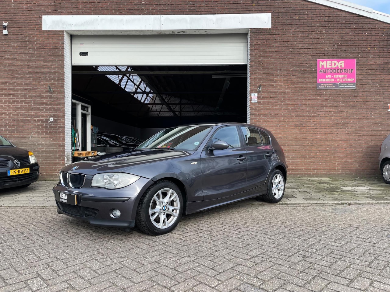 BMW 1-serie - 118i Business Line | Airco - AutoWereld.nl