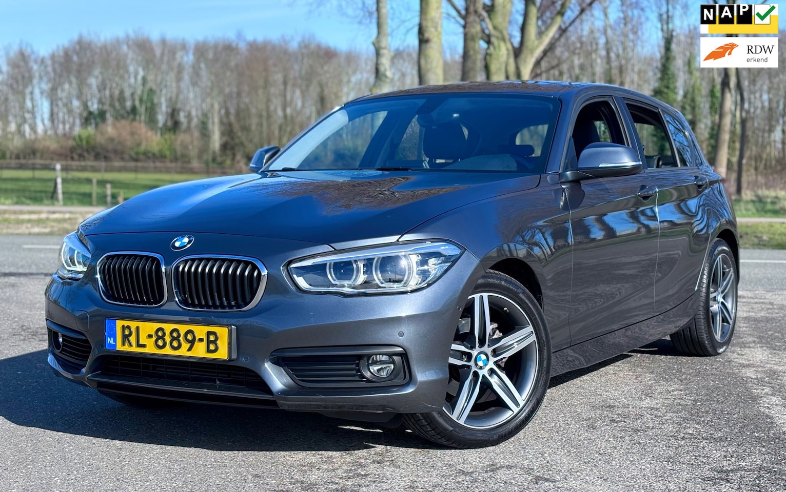 BMW 1-serie - 118i Corp Lease Exec Aut/Leder/Schuifdak/Pdc - AutoWereld.nl