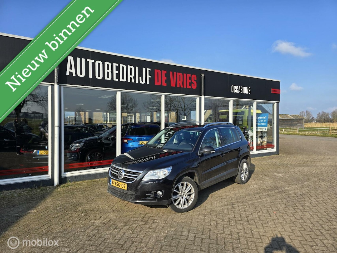 Volkswagen Tiguan - 2.0 TDI Track&Field 4Motion 18Inch/Stoelverwarming/DSG/Trekhaak - AutoWereld.nl