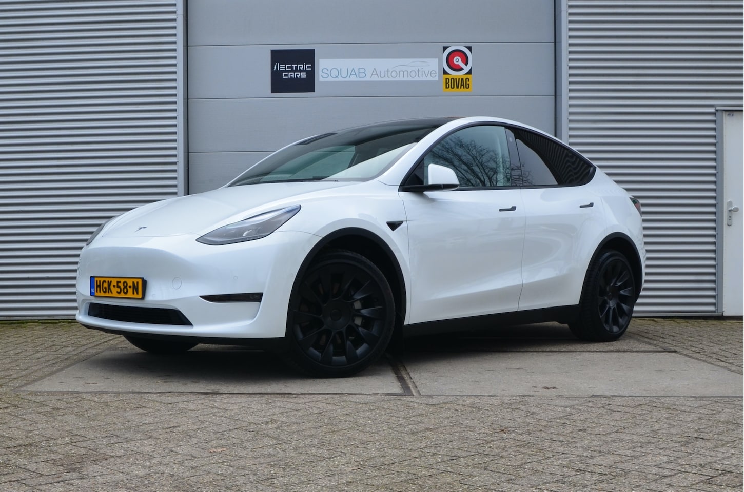 Tesla Model Y - Long Range AWD 75 kWh <7.000km!, Trekhaak (1.600kg), 20" Alu, AutoPilot - AutoWereld.nl