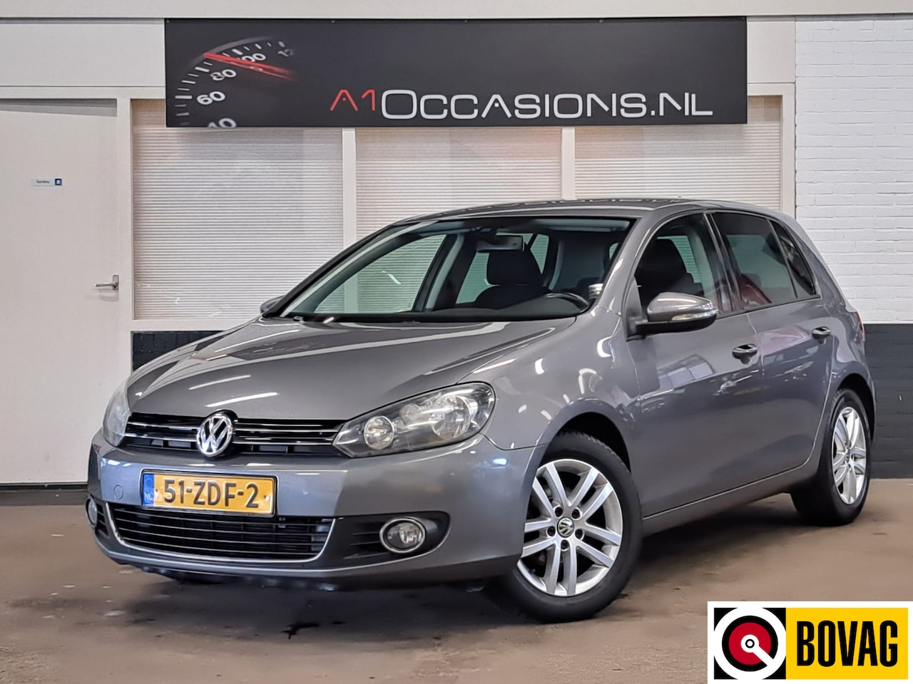 Volkswagen Golf - 1.2 TSI Highline BlueMotion + NAVI - AutoWereld.nl