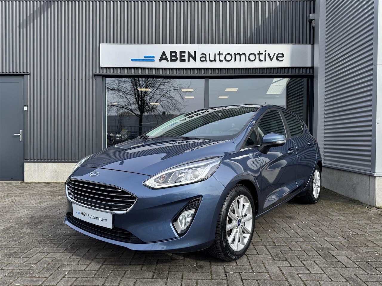 Ford Fiesta - 1.0 EcoBoost Titanium 1.0 EcoBoost 95PK Titanium 5-deurs (CARPLAY|WINTERPACK|4-SEIZ) - AutoWereld.nl