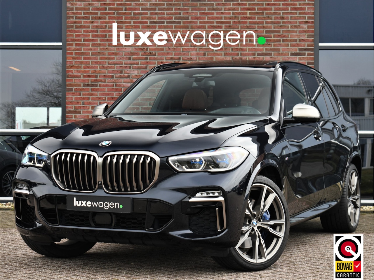 BMW X5 - M50d xDrive 400pk Pano Trekh ACC Massage 360 HUD H/K Adp-M-onderstel 4-wielsturing - AutoWereld.nl