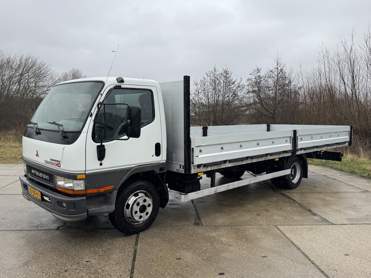 Mitsubishi Canter - 100kw XXL open laadbak 3 zits trekhaak - AutoWereld.nl