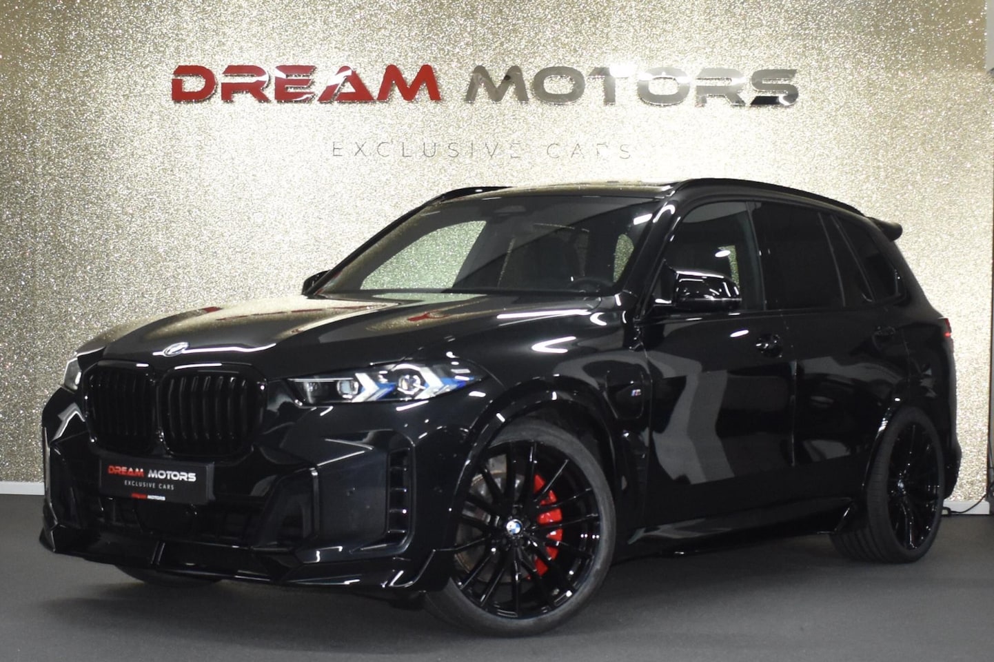 BMW X5 - XDrive50e M-Sport Pro 489pk | AKRAPOVIC | PANODAK - AutoWereld.nl