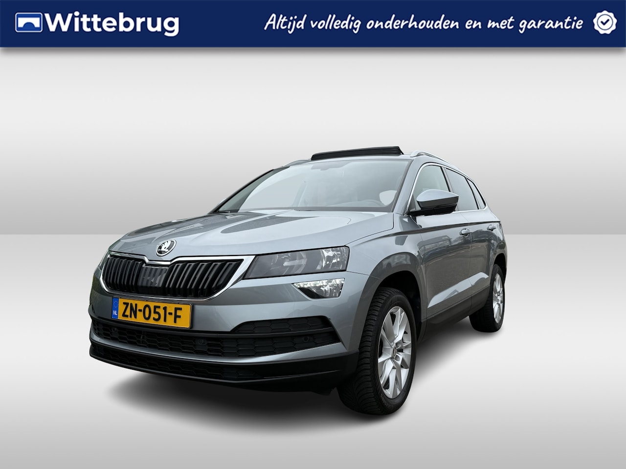 Skoda Karoq - 1.5 TSI ACT Ambition Business /DSG/ Metallic/ NAVI / APP.Connect / 17LMV / CAMERA / PANODA - AutoWereld.nl