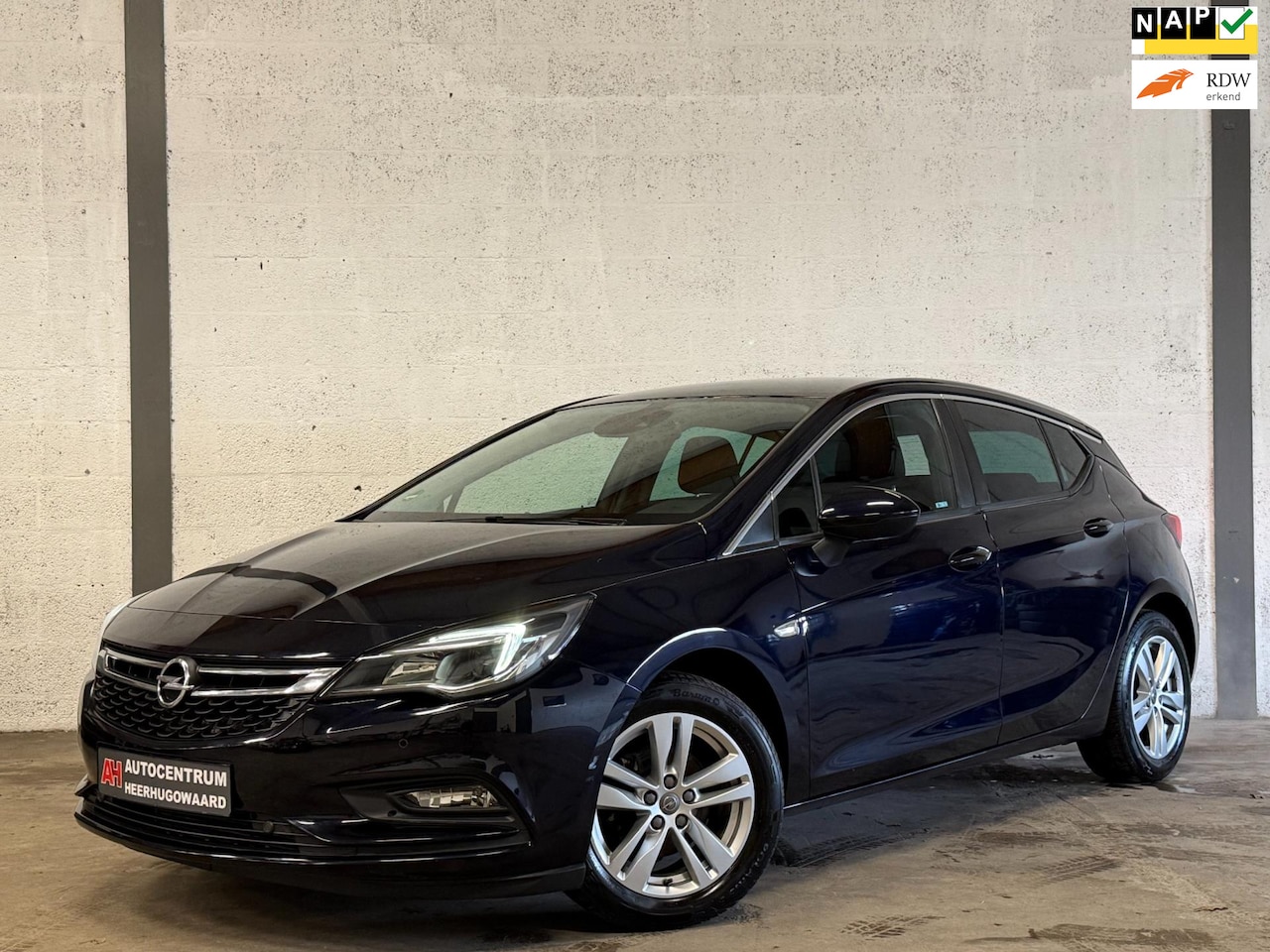 Opel Astra - 1.4 Turbo Navi|Cruise|Carplay|PDC|Dealer Onderhouden !! - AutoWereld.nl