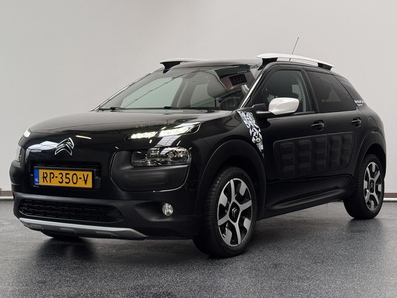 Citroën C4 Cactus - 1.2 PureTech Rip Curl | Panorama | Camera | Navi - AutoWereld.nl