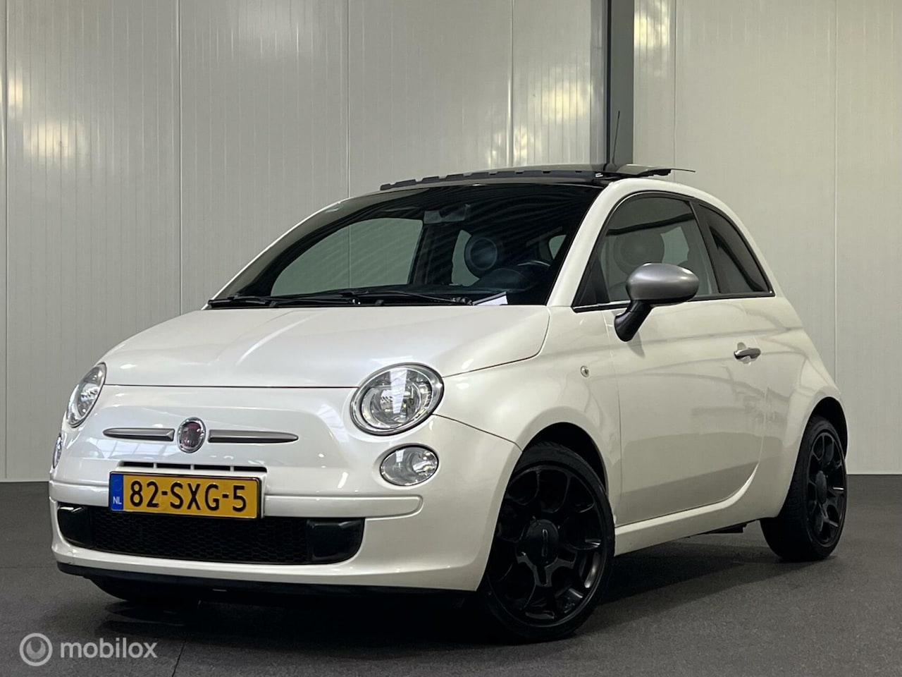 Fiat 500 - 0.9 TwinAir Lounge [ NAP schuifdak LM ] - AutoWereld.nl