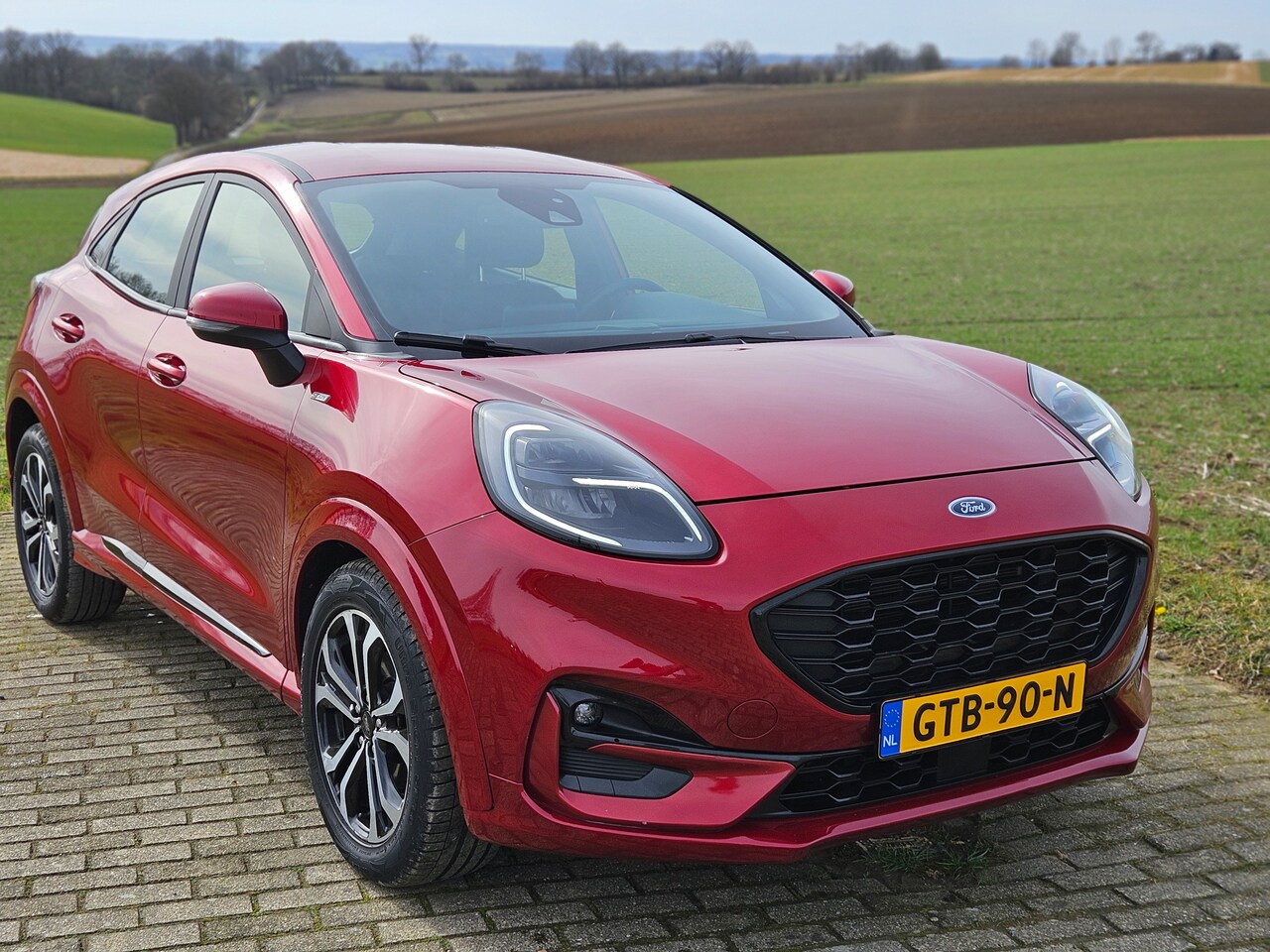 Ford Puma - 1.0 EcoBoost Hybrid ST-Line Tech Pakket | Full LED | Lucid red - AutoWereld.nl
