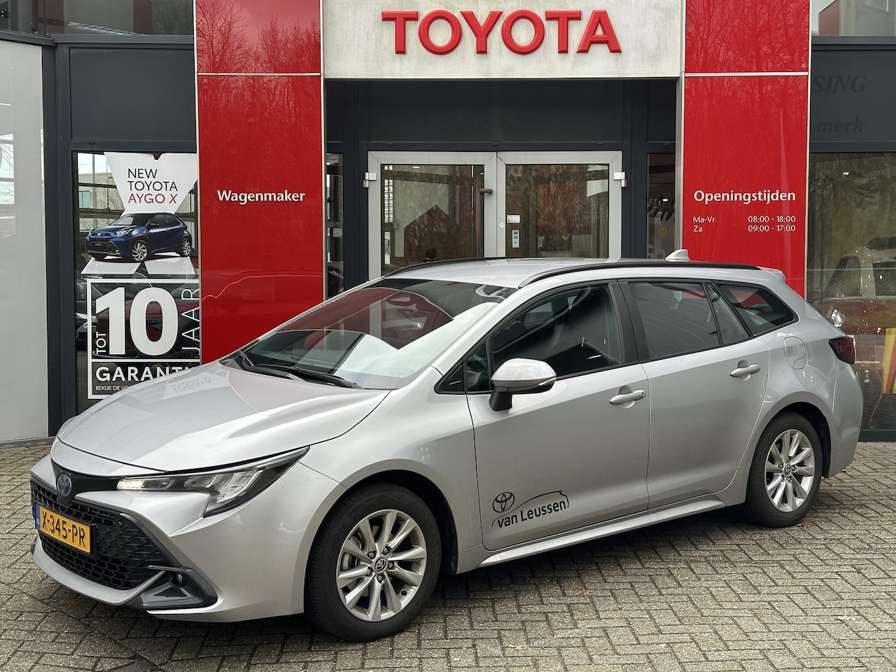 Toyota Corolla Touring Sports - Hybrid 140 NL-AUTO APPLE / ANDROID AD-CRUISE LED DAB+ CAMERA LICHTMETAAL - AutoWereld.nl