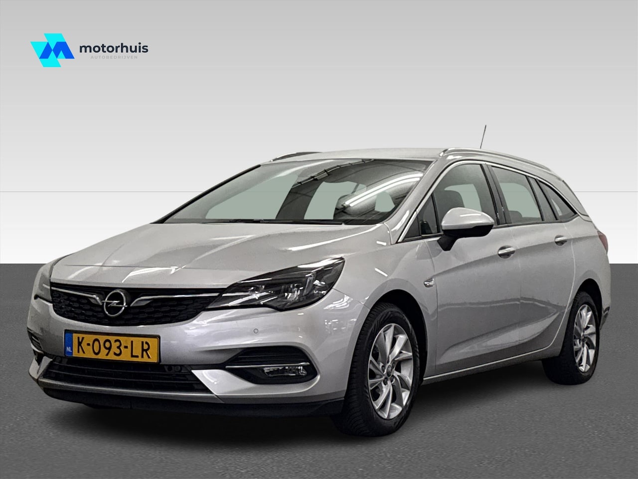 Opel Astra Sports Tourer - 1.2 TURBO 130PK BUSINESS ELEGANCE NAVI PDC TEL TREKHAAK LED NAP - AutoWereld.nl