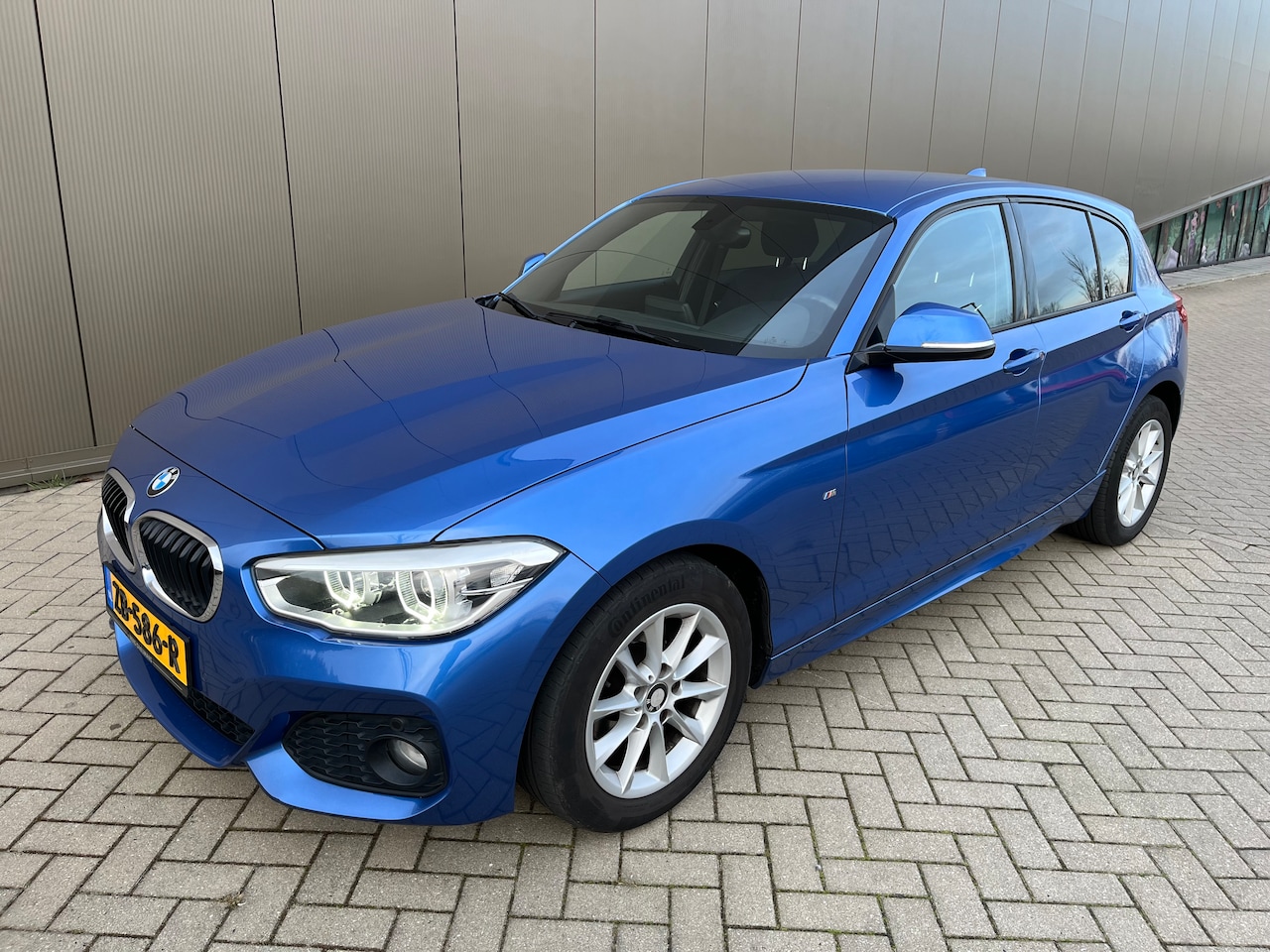 BMW 1-serie - 118i M Sport Cruise control, LED verlichting, Navigatie, Parkeersensoren, M-Sport, Sportonderstel, Spor - AutoWereld.nl