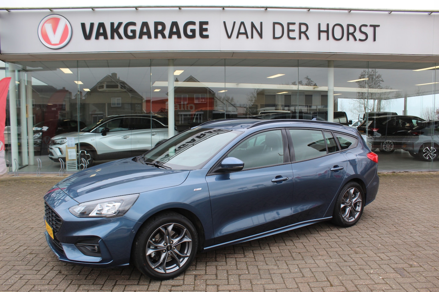 Ford Focus Wagon - 1.0 EcoBoost Hybrid ST Line Business 1.0 EcoBoost 125pk Hybrid ST Line Business, 1e Eigenaar Climate control , Navigatie, Cruis - AutoWereld.nl