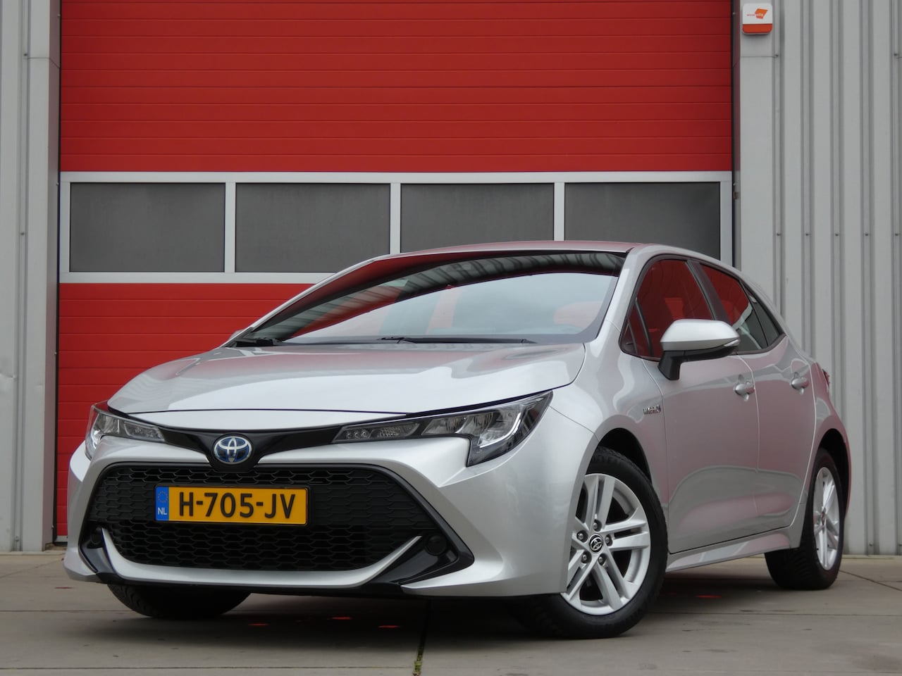 Toyota Corolla - 1.8 Hybrid Active/ lage km/ zeer mooi! - AutoWereld.nl