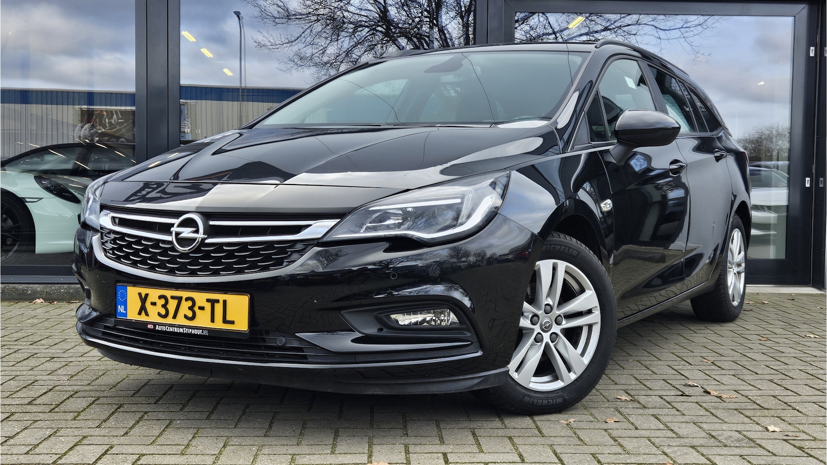 Opel Astra Sports Tourer - 1.4 Turbo 120 Jaar Edition Automaat - AutoWereld.nl