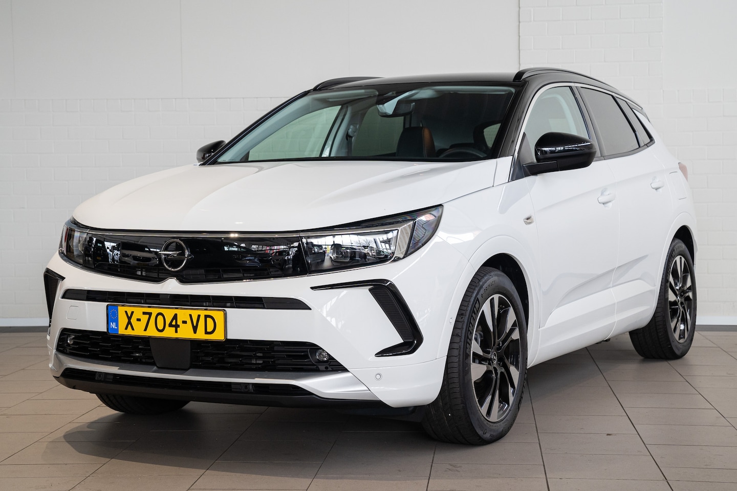 Opel Grandland - 1.6 Turbo Hybrid 225PK | Stoel & Stuurverwarming | Verw. Voorraam | LED | Navigatie | - AutoWereld.nl