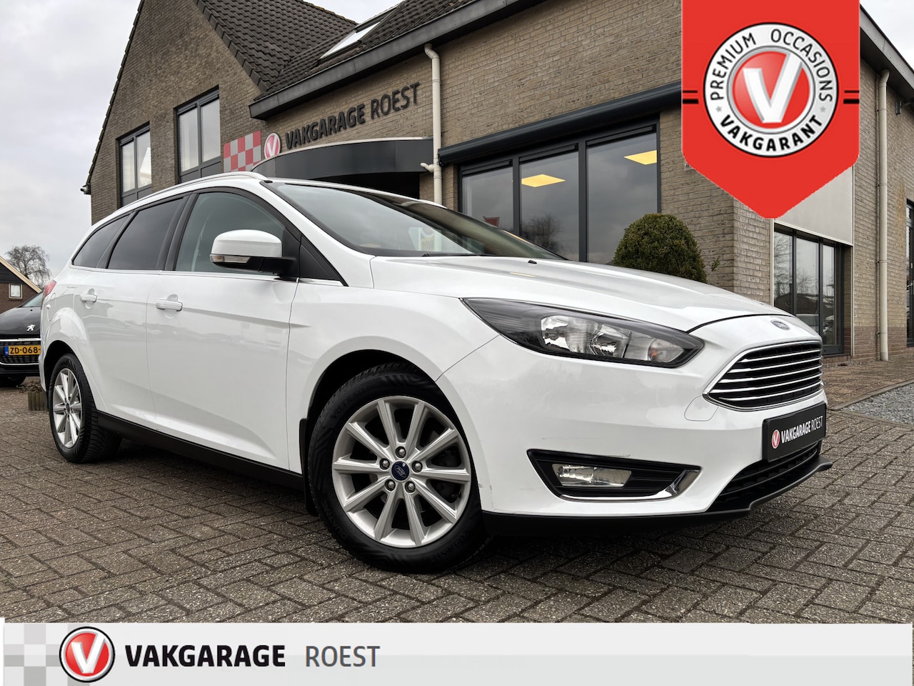 Ford Focus Wagon - 1.0 Turbo Titanium Navigatie / Stoelverwarming / All-Seasons - AutoWereld.nl