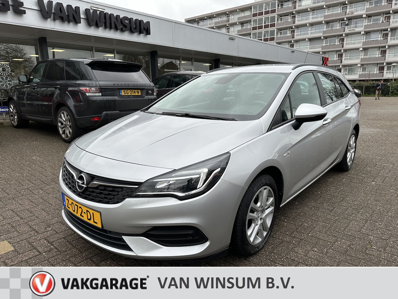 Opel Astra Sports Tourer - 1.4 Business Edition Automaat Navi Lmv Pdc Cruise Ned Auto - AutoWereld.nl