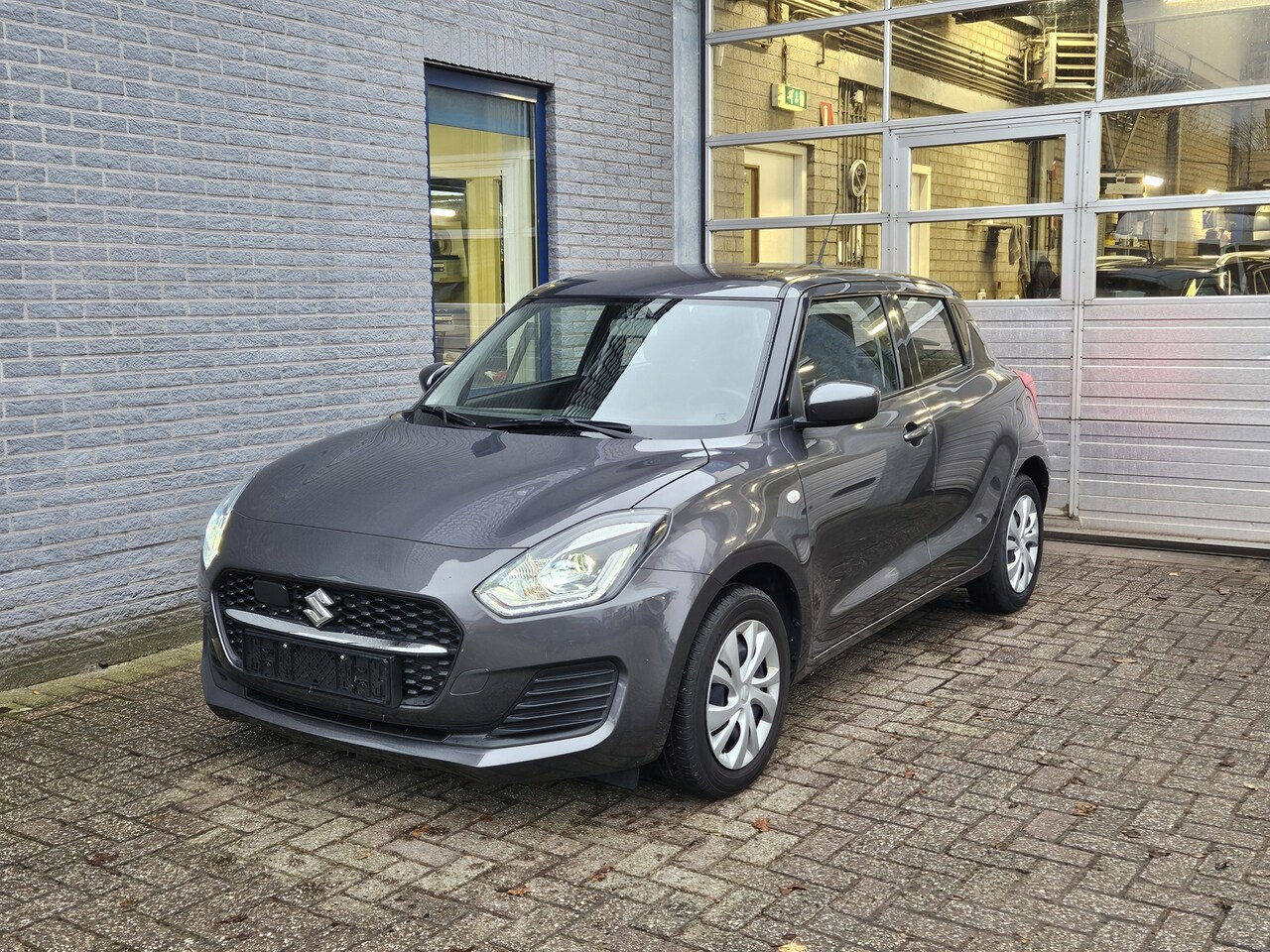 Suzuki Swift - 1.2 Comfort Smart Hybrid Inclusief Afleveringskosten - AutoWereld.nl